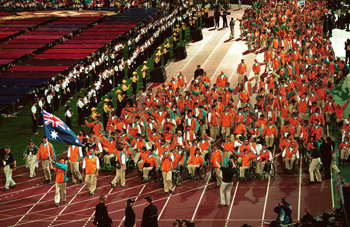 © Sport the library/Bill BachmanSydney 2000 Paralympic GamesOpening CeremonyAustralia - Brendan Burkett - Swimming, carrying the flag
